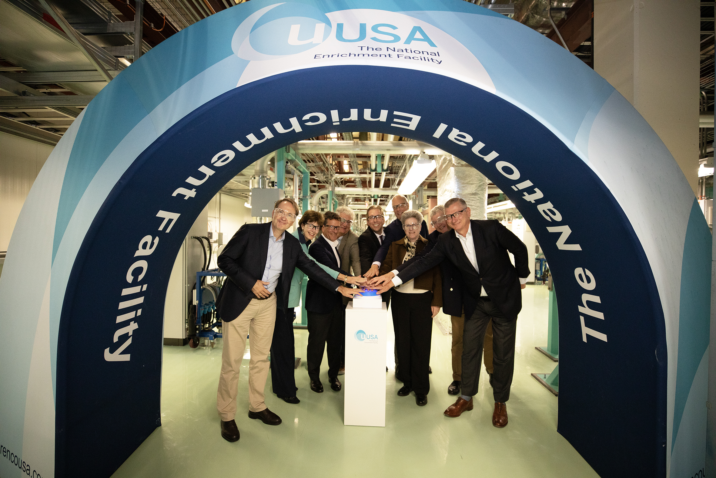 Urenco's Board of Directors and Urenco USA's Managing Director press the button for a ceremonial startup of the 6th new cascade of uranium enrichment capacity at Urenco USA